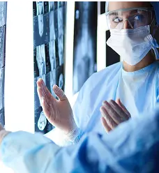 radiologist reviewing mri scans